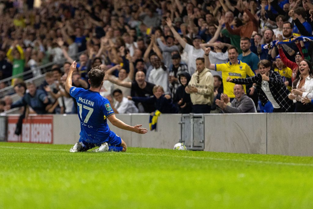 Ryan Maclean celebrating with Wimbledon fans